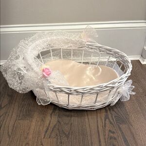 White Wicker Baby Basket with Pink Accents